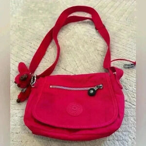 Bright pink Kipling crossbody small